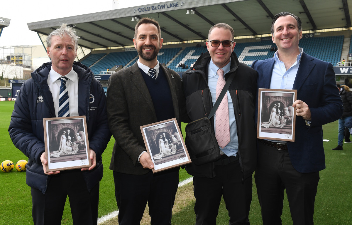 Club and trust supporter Gianluca Sardi presents picture of first Lions Chairman